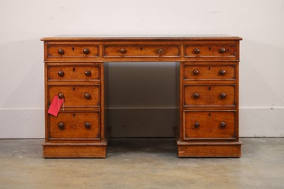 Lot 539 - An oak pedestal desk
