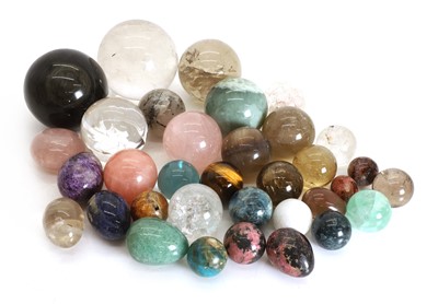 Lot 314 - A collection of semi precious polished stone spheres