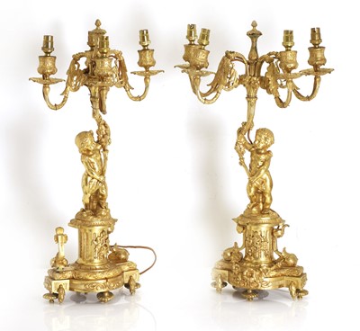 Lot 488A - A pair of gilt brass Louis XVI style ormolu brass figural table candelabra