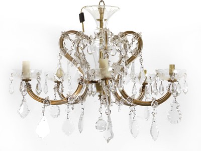 Lot 479 - A pair of five-light moulded glass chandeliers