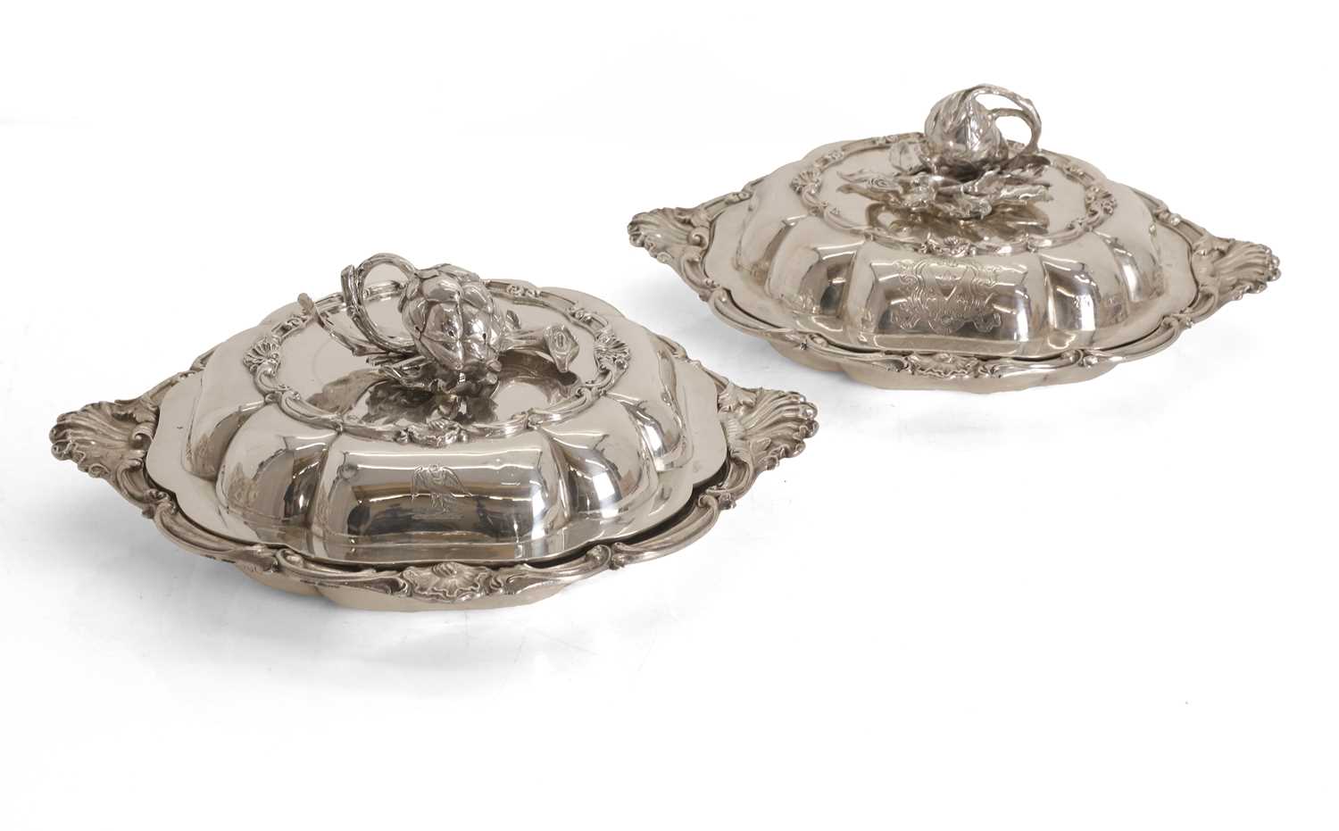 Lot 39 - A matched pair of Hunt and Roskell silver dishes and covers