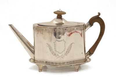 Lot 26 - A George III silver teapot on stand