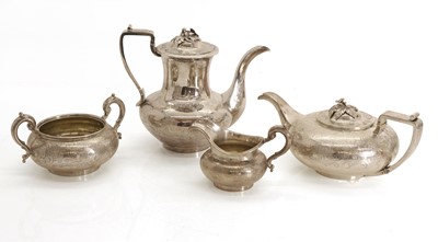 Lot 48 - A silver four piece coffee and tea service