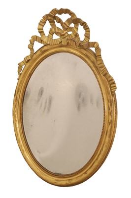 Lot 493 - An oval gilt wall mirror