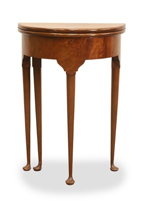 Lot 560 - A mahogany small demi lune table