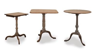 Lot 554 - Two tilt top wine tables