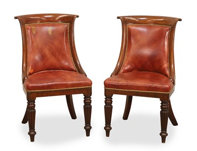 Lot 548 - A pair of Regency mahogany bergere library chairs