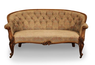 Lot 517 - A Victorian walnut-framed salon settee