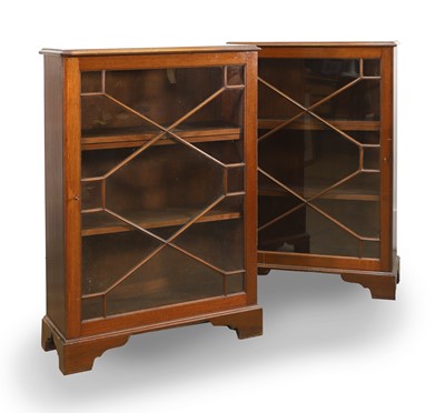 Lot 530 - A pair of mahogany pier cabinets