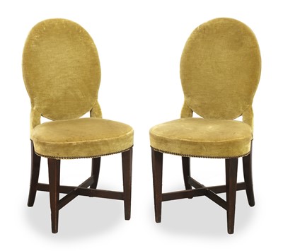 Lot 576 - A pair of green velvet dining chairs