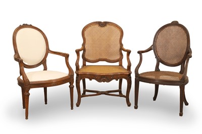 Lot 525 - A collection of three salon chairs