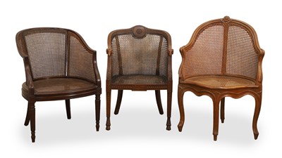 Lot 563 - A pair of Victorian mahogany and cane seated armchairs