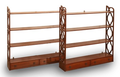 Lot 503 - A pair of fruitwood Regency style hanging wall shelves