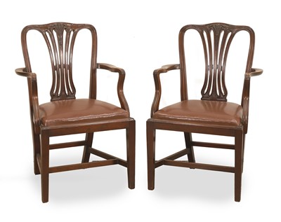 Lot 573 - A pair of mahogany elbow chairs