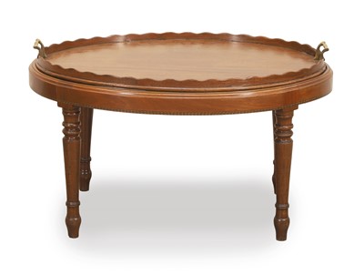 Lot 572 - An oval mahogany tray on stand