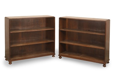 Lot 537 - A pair of teak open bookcases
