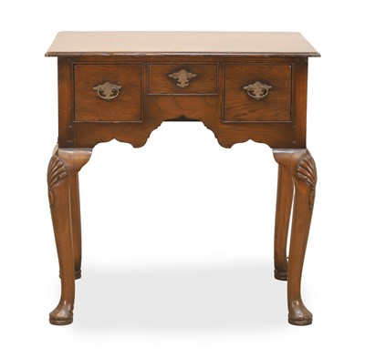 Lot 546 - A George l style oak lowboy