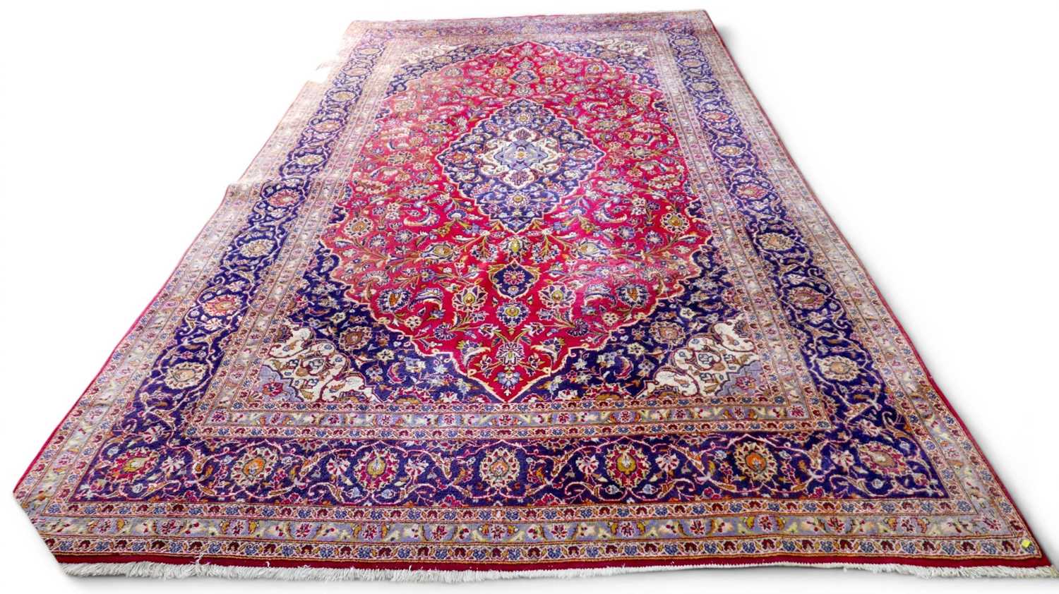 Lot 466 - A Persian Kashan carpet