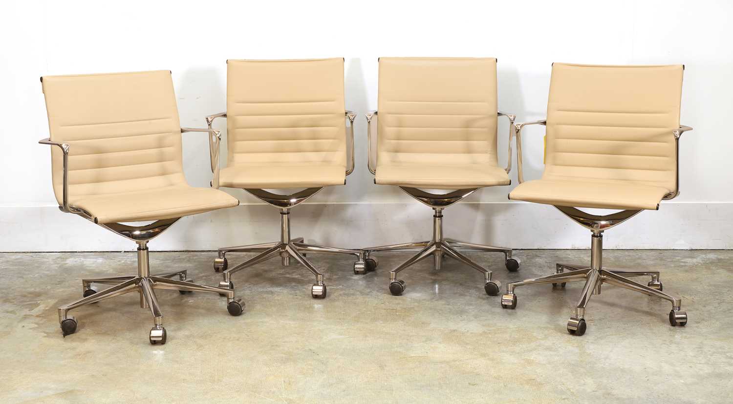 Lot 506 - Four ICF 'Executive' cream leather office chairs