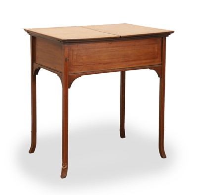 Lot 510 - An Edwardian walnut desk table