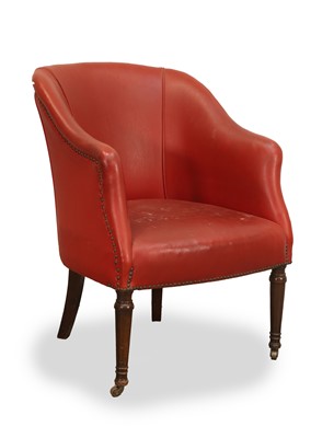 Lot 531 - A red leatherette upholstered tub chair