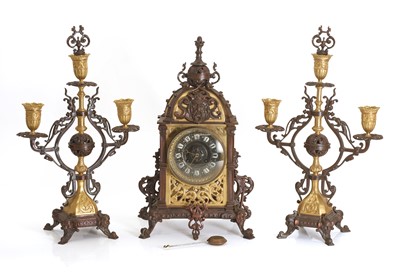 Lot 202 - A French gilt metal and bronze clock garniture