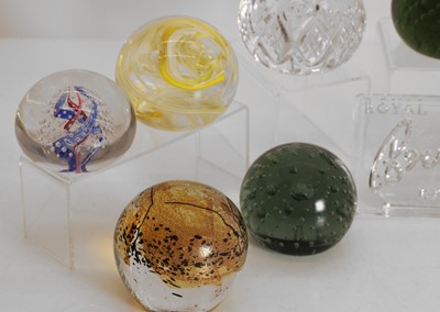 Lot 154 - A collection of glass paperweights