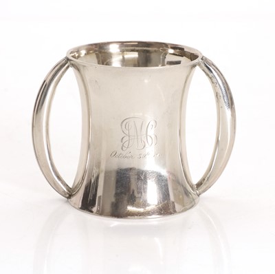 Lot 13 - A silver twin handled christening mug