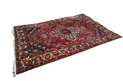 Lot 421 - A Heriz carpet