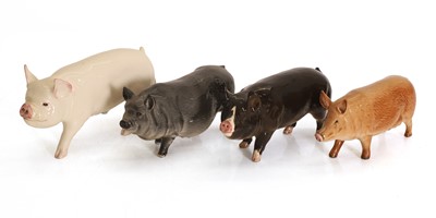 Lot 102 - A collection of Beswick pigs and a boars