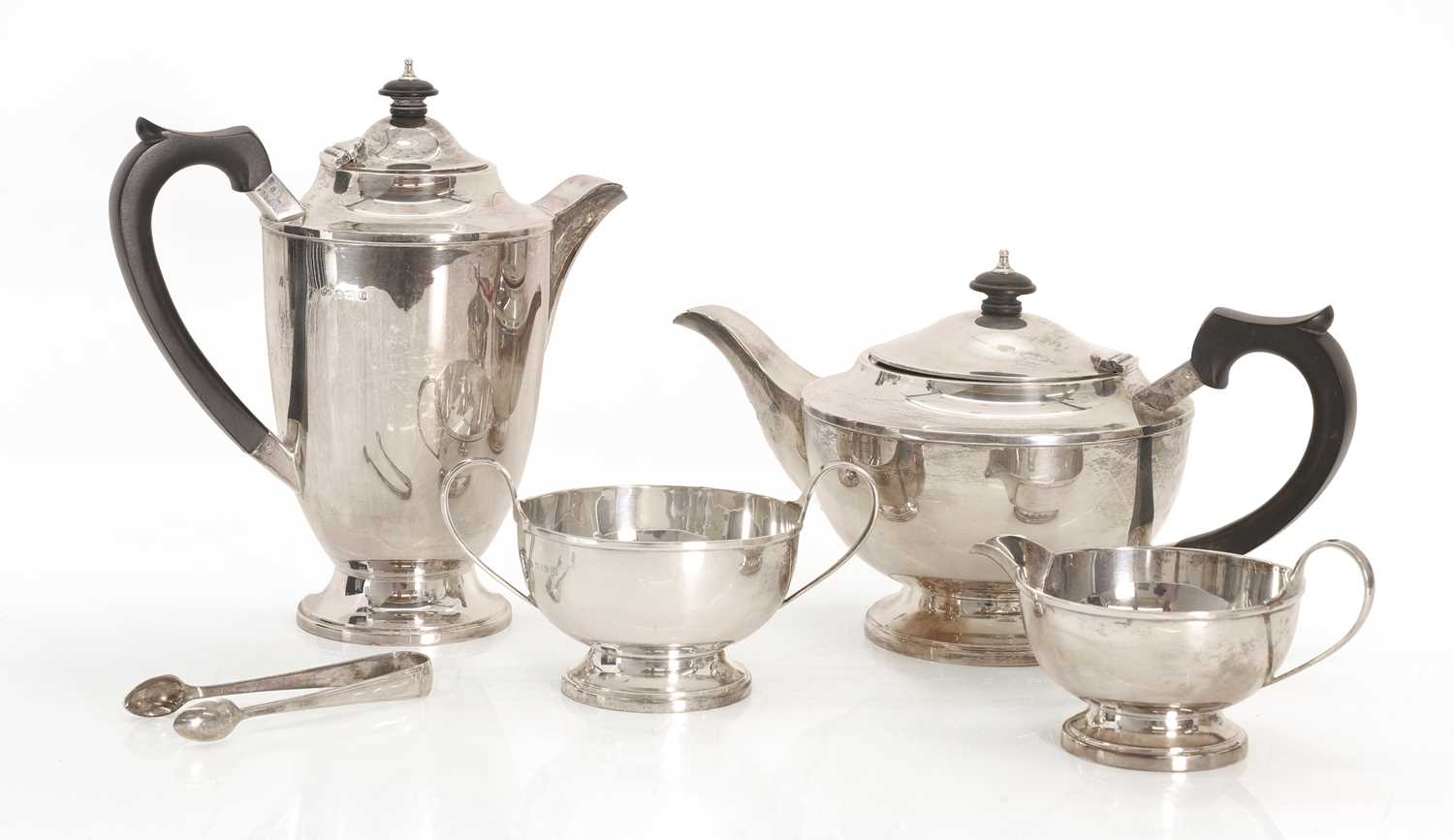 Lot 19 - A silver four piece tea service