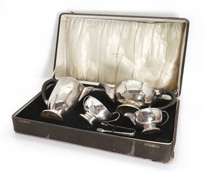Lot 19 - A silver four piece tea service