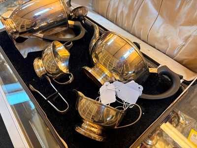 Lot 19 - A silver four piece tea service