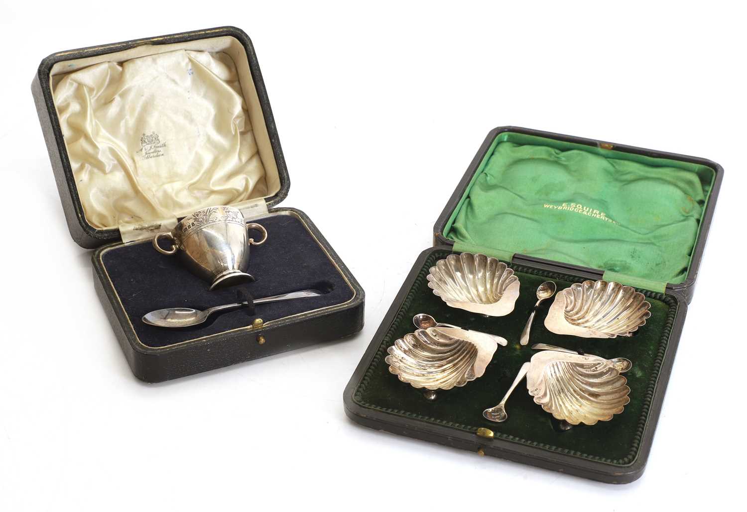 Lot 3 - A silver set of four silver salts and spoons