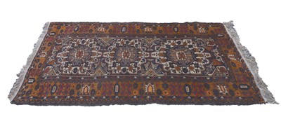 Lot 429 - An Afghan wool rug