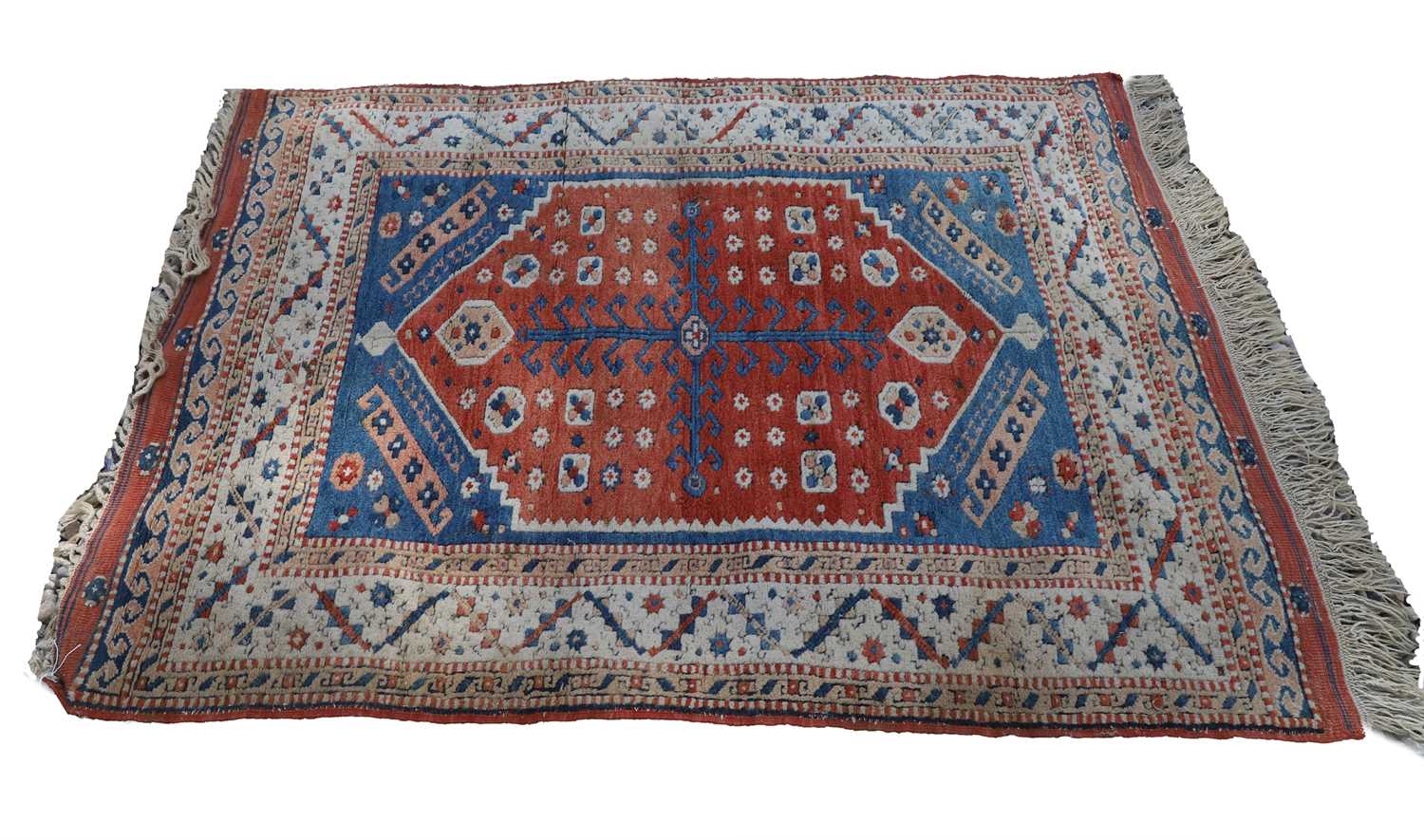 Lot 427 - A hand knotted Kazak wool rug