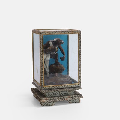 Lot 86 - A cold-painted lead figure of a gorilla holding a naked woman