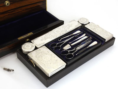 Lot 310 - A coromandel and silver vanity set