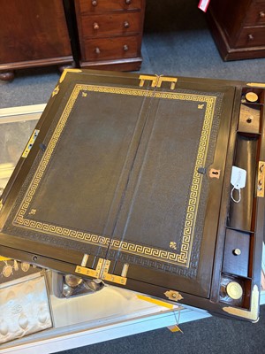 Lot 312 - A burr walnut and ebonised writing slope