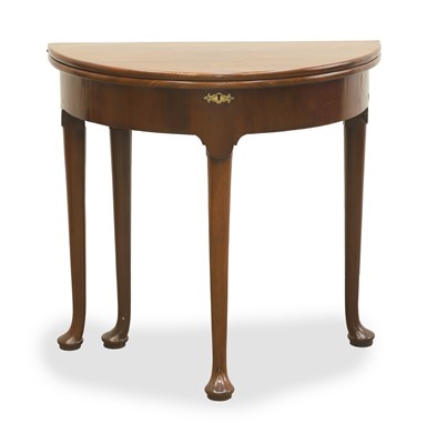 Lot 524 - A George II walnut demi-lune card table