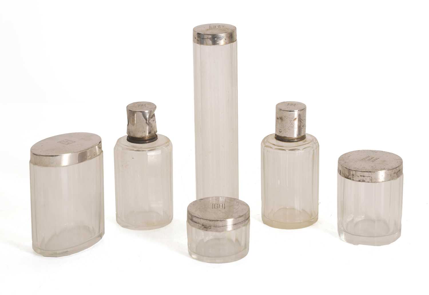 Lot 22 - A set of Art Deco silver mounted glass vanity jars