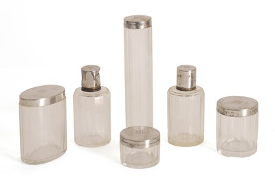 Lot 22 - A set of Art Deco silver mounted glass vanity jars