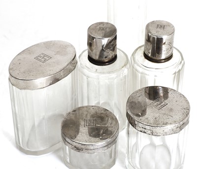 Lot 22 - A set of Art Deco silver mounted glass vanity jars