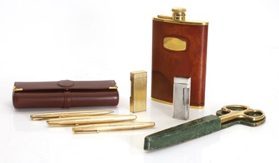 Lot 304 - Three gold-plated Parker pens