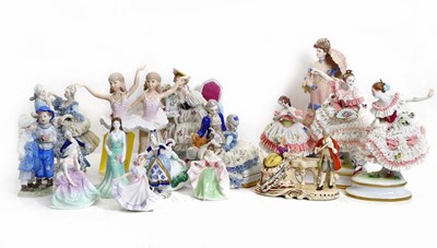 Lot 102 - A collection of porcelain figures