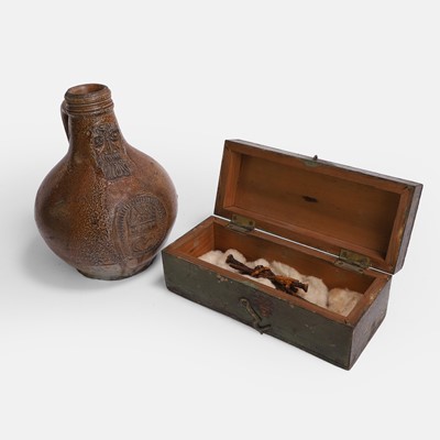 Lot 12 - A salt-glazed stoneware witch's bellarmine bottle