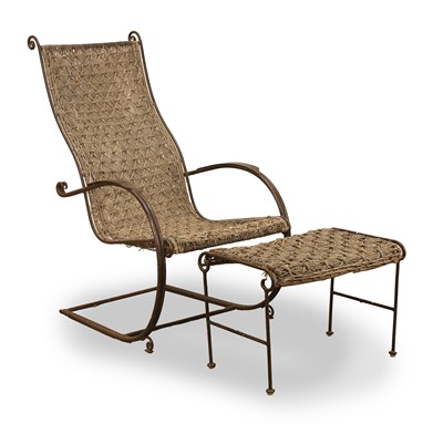 Lot 502 - A Franco Albini style rocking chair and footstool