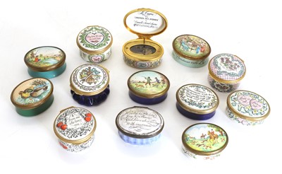 Lot 107 - A collection of enamelled pill boxes