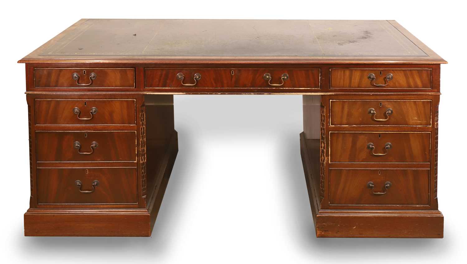 Lot 540 - A mahogany and leather inset partners desk