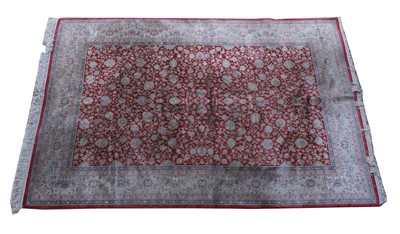 Lot 426 - A Turkish silk rug